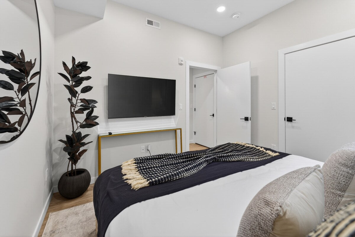 Somerville Modern Condo — design by Heather, setup by EHP. Photography courtesy of Executive Haven.