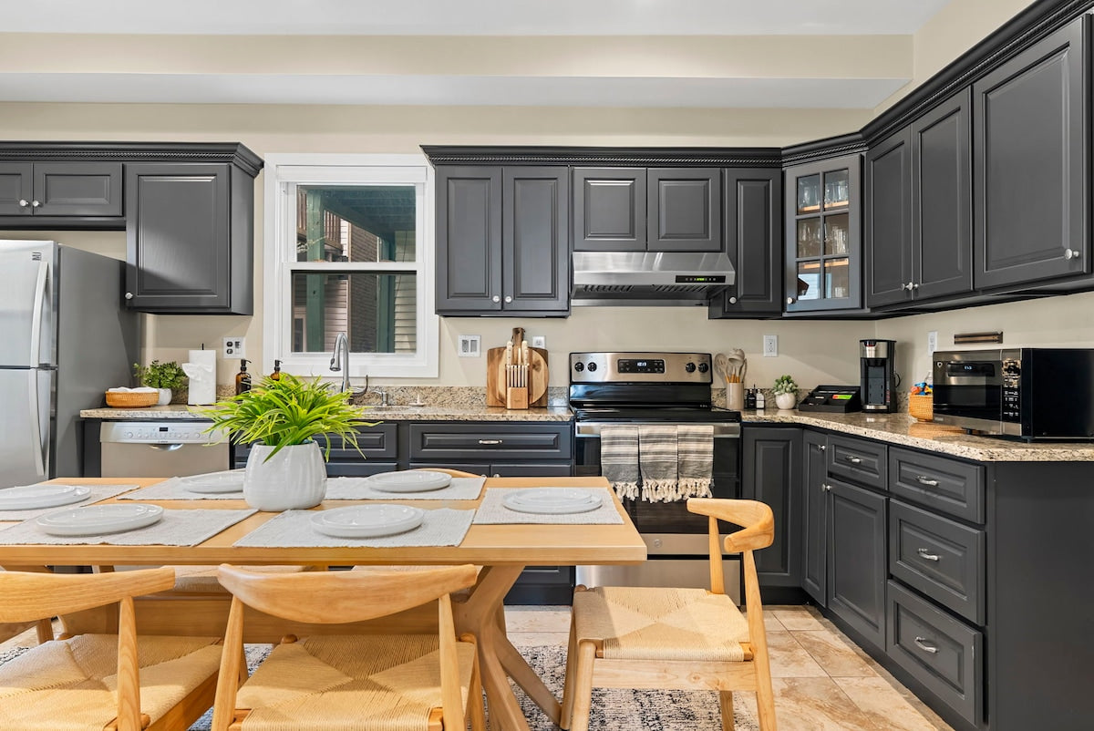 Cambridge Apartment — client's design; setup assist, lighting and patio build by EHP. Photography courtesy of R&R Premier Stays.