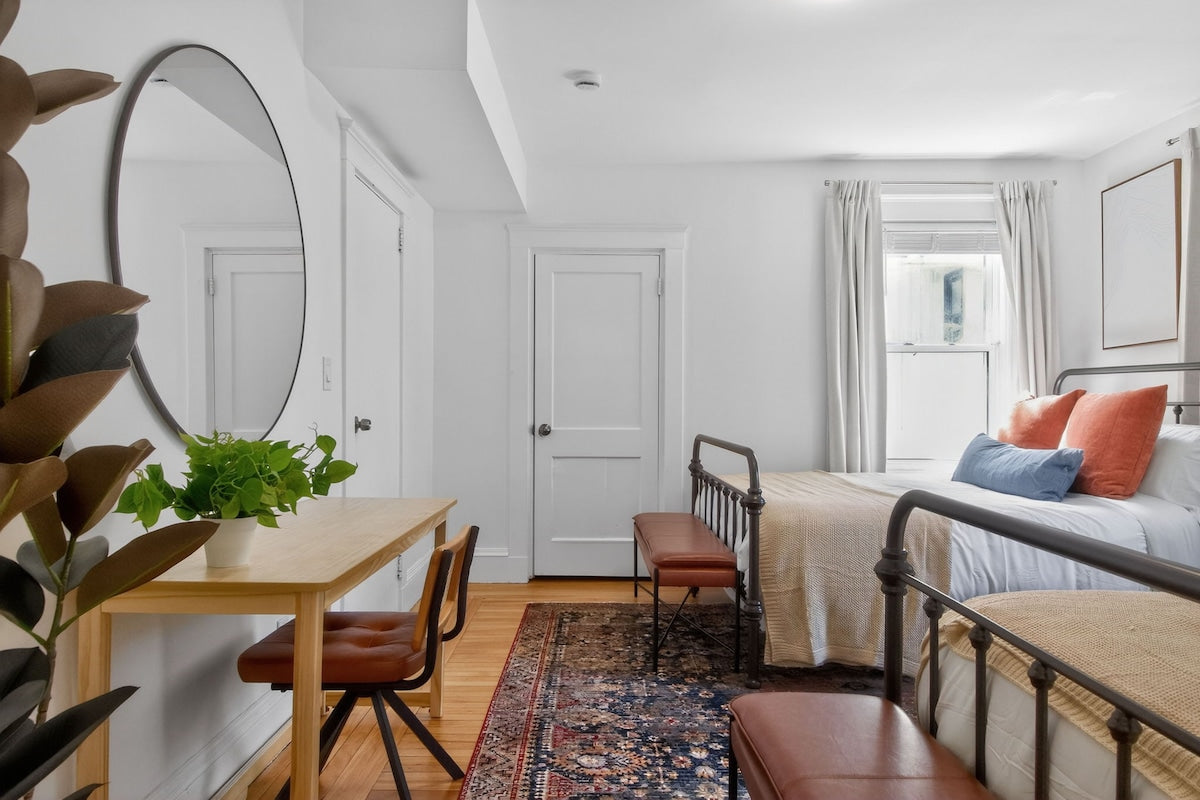 Luxury Cambridge Hideaway — bedroom with workspace